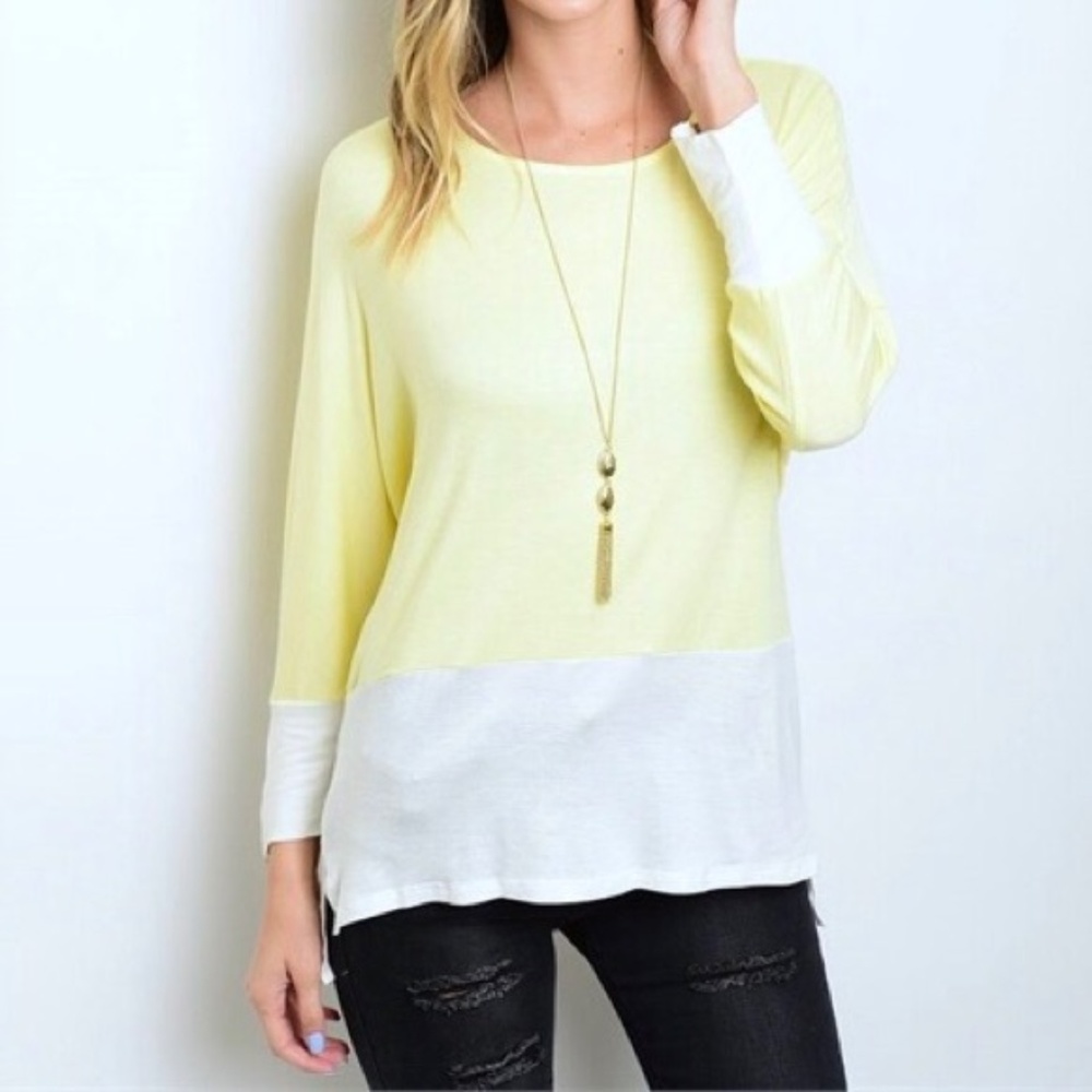 Jersey knit top with zipper detail. Yellow